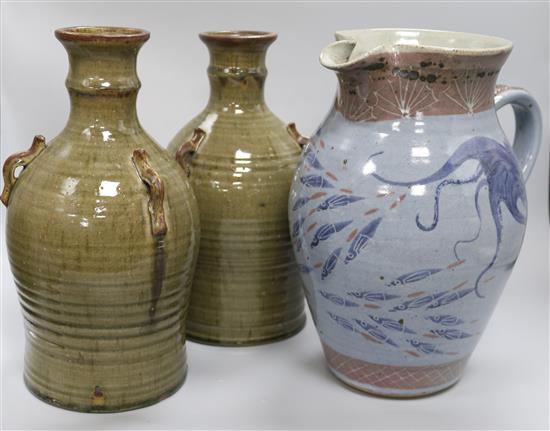 A Chris Patton Studio pottery earthenware jug and a pair of Michael Leach Yelland Pottery three-handled vessels H 30cm